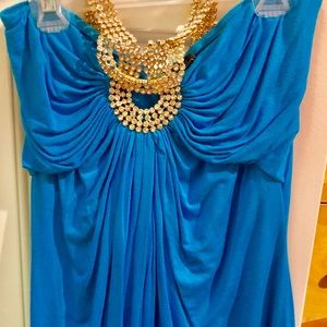 Teal strapless top with gold jeweled halter straps